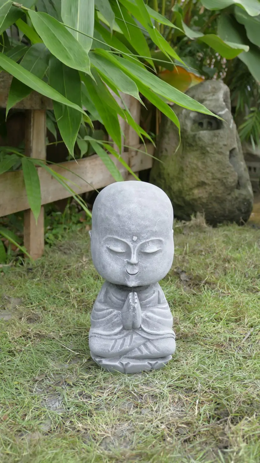  Product image 1 of the product “Ishaan - Sitting Monk Big Head, 29.5cm Height | cast stone ”